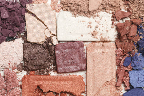 istock Crushed neutral toned eyeshadow make up palette isolated on white background 1396925739