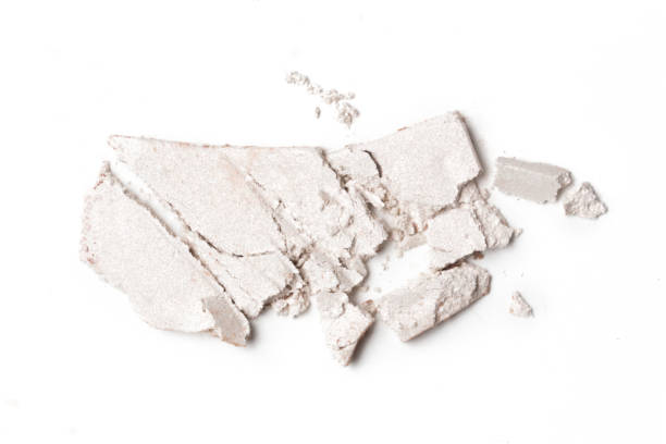 istock Crushed white eyeshadow makeup isolated on white background 1396925995