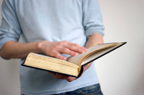 istock Young Man Reading Book PS-42278 139692631