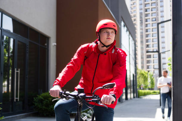 istock Courier on bicycle with parcel, bike delivery service 1396926725