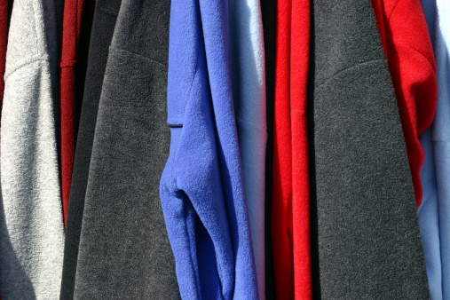 This a close-up of multicolored fall clothing.