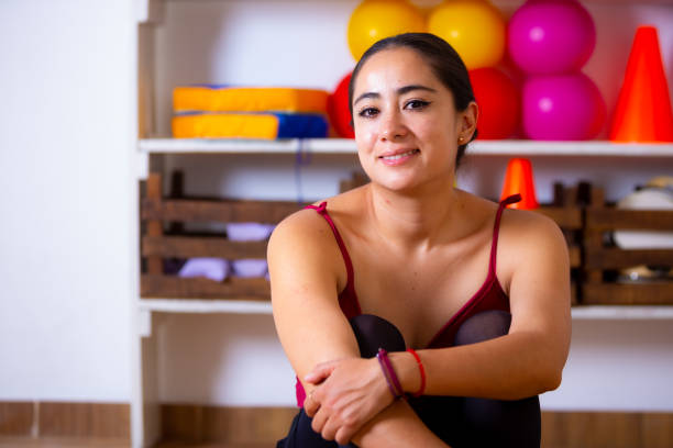 istock Woman preparing to practice ballet. 1396931637