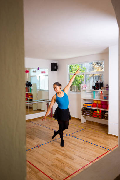 istock Woman preparing to practice ballet. 1396932883