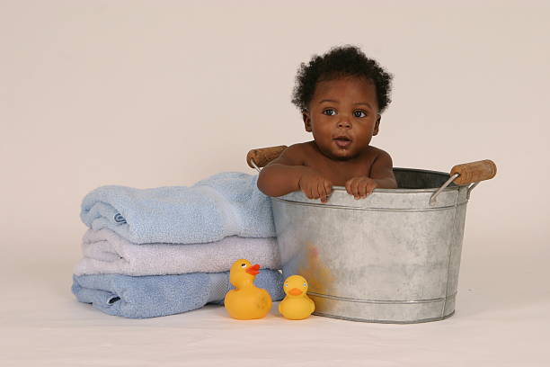Little baby posing in the tub