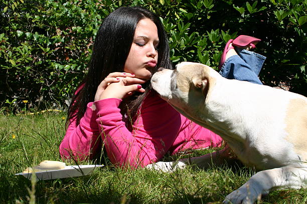 istock young woman and dog 139693465