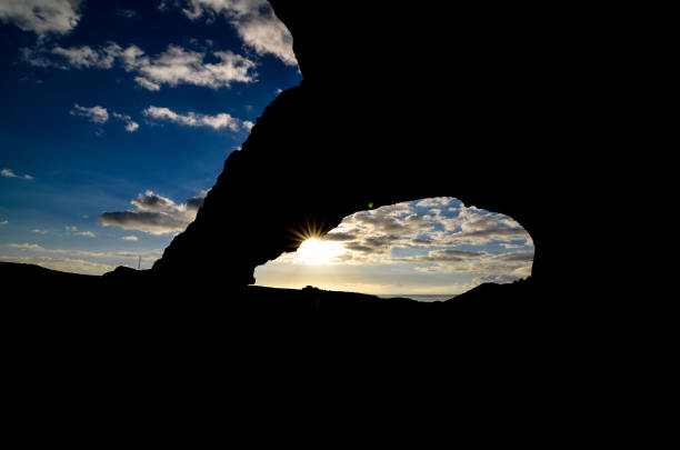 istock Natural Arch in the Desert 1396938510