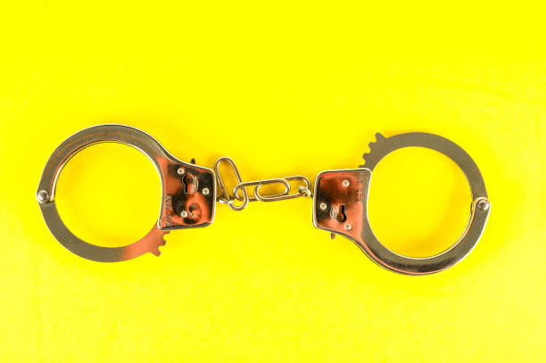 istock Close-up of handcuffs 1396938589
