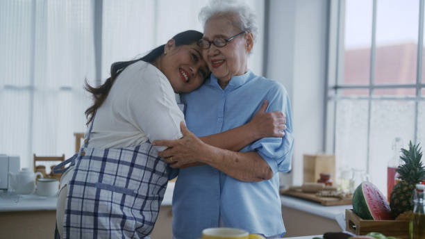 istock daughter showing love to mom 1396941952