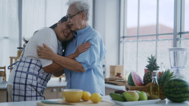 istock daughter showing love to mom 1396941958