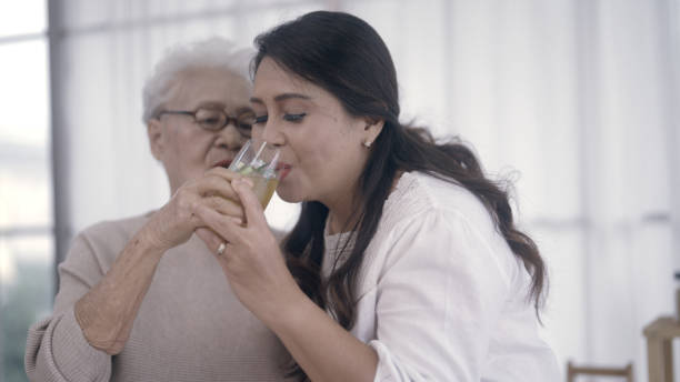 istock daughter showing love to mom 1396941972
