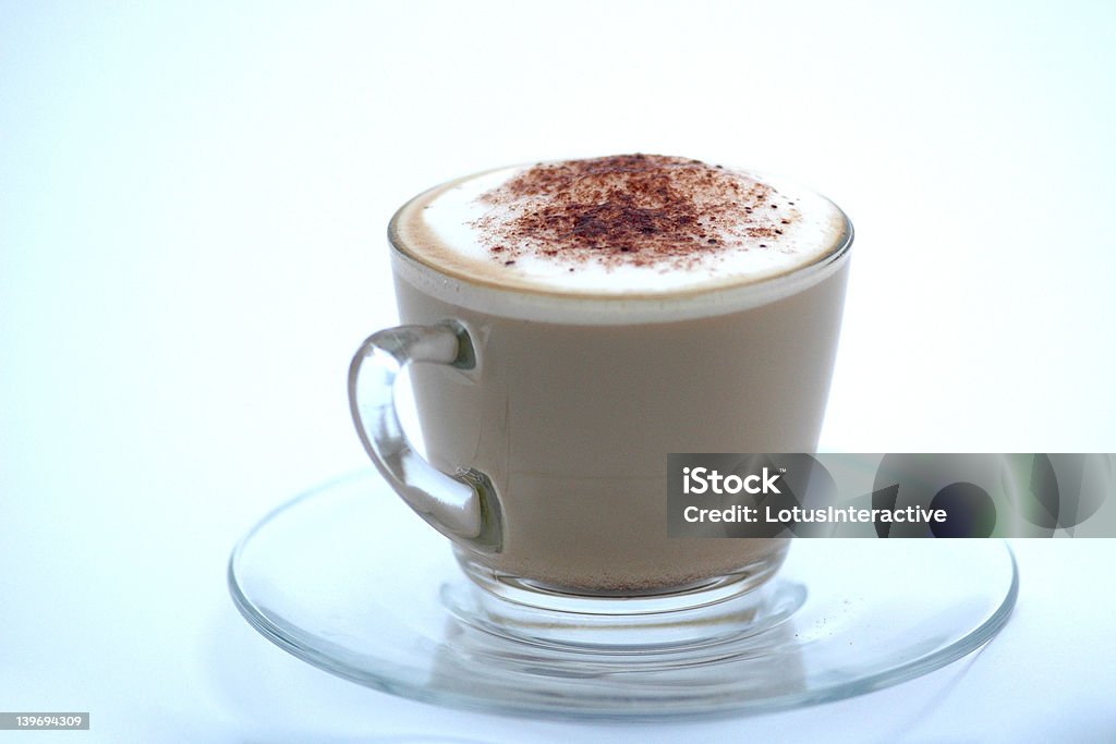 Home made latte in clear glass, cup and saucer 4 Home made latte in clear glass, cup and saucer Brown Stock Photo