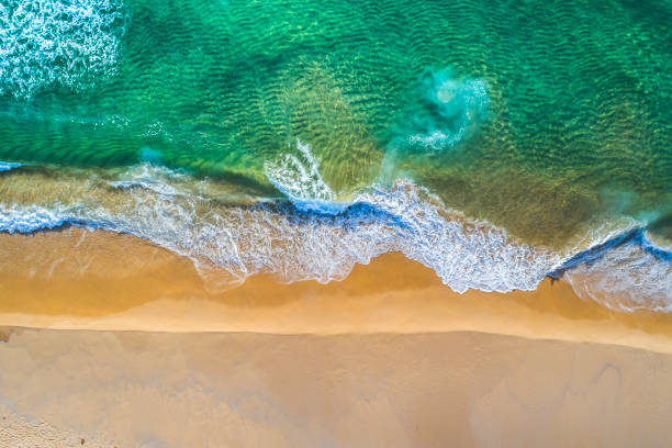 istock High angle coastal view of clear emerald green water 1396944632