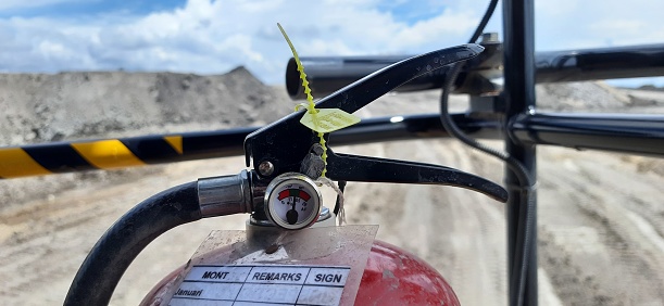 Pressure gauge of a fire suppression mounted on a heavy duty dump truck unit at a coal mining site