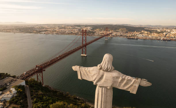 istock Statue near river with bridge 1396946153