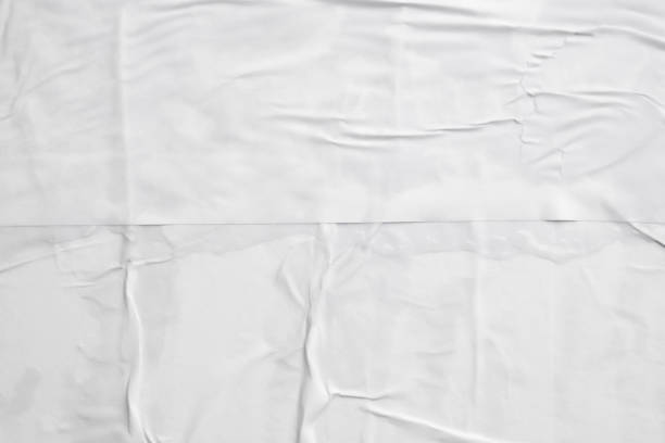 istock white crumpled and creased paper poster texture background 1396946324