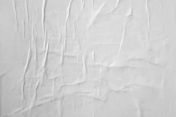 istock white crumpled and creased paper poster texture background 1396946526