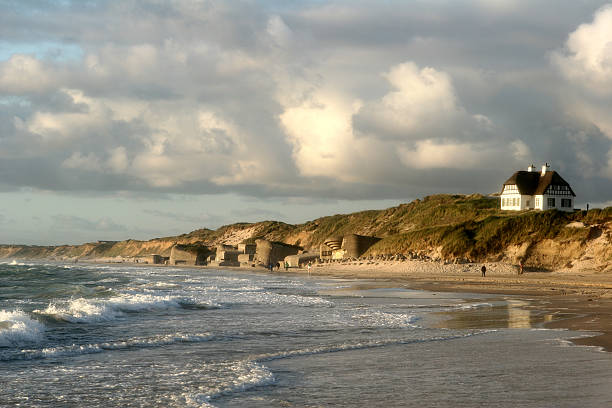 Outdoor photo of sunny Danish seascape with waves stock photo