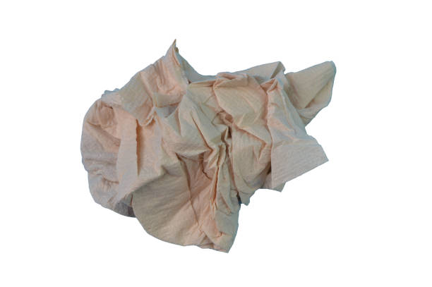 istock Brown crumpled paper tissue isolated on a white background 1396949380