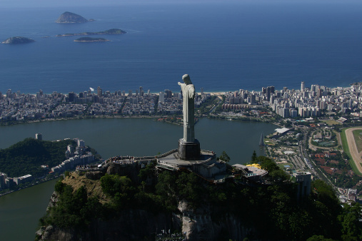 Aerial View of the Christ sculpture on Corcovado mountain onto Rio de Janeiro with Ipanema and Leblon