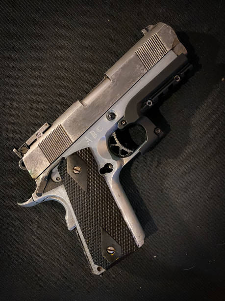 istock Old and dirty pistol gun 1396958087