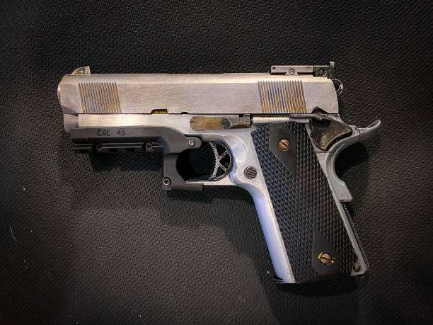 istock Old and dirty pistol gun 1396958111