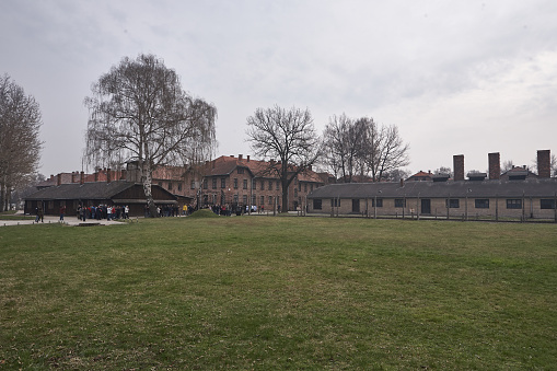 Oswiecim, Poland - March 31, 2014 : View of people entering the former Nazi concentration camp Auschwitz-Birkenau