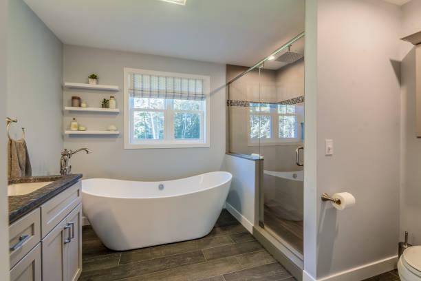 istock Large free standing bathtub in new bathroom 1396961637