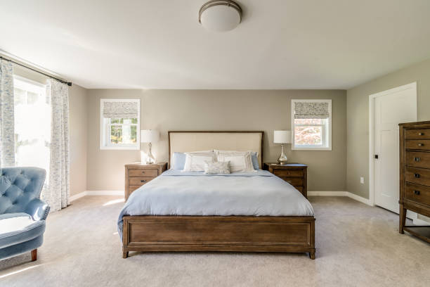 istock Huge bedroom with wood bed frame 1396961658