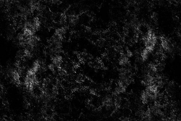 istock Abstract textured dark stone wall surface with heavy grunge texture 1396966665