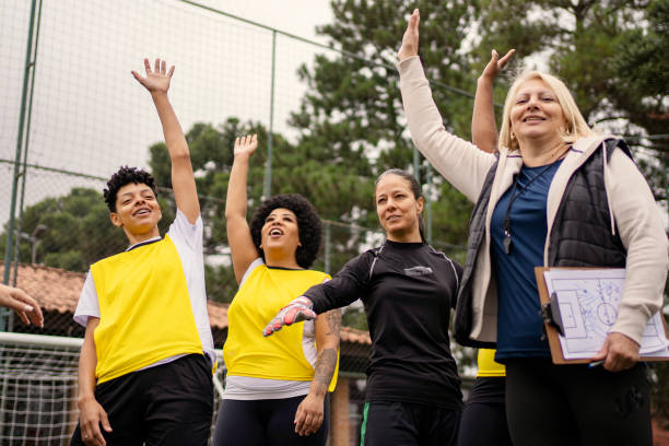 istock Women's soccer team greeting before the game 1396966745