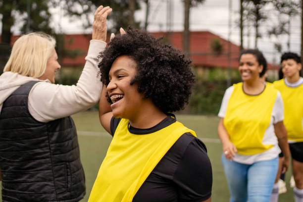 istock Women's soccer team greeting before the game 1396966755