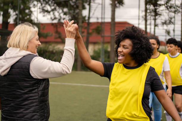 istock Women's soccer team greeting before the game 1396966759