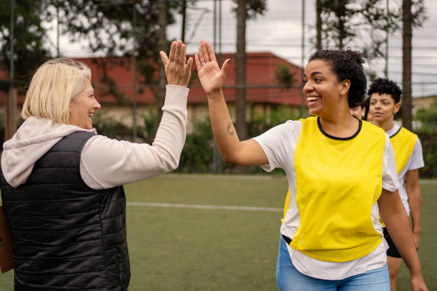 istock Women's soccer team greeting before the game 1396966760