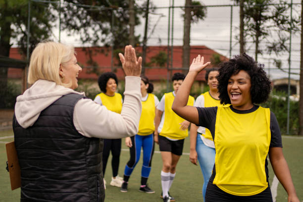 istock Women's soccer team greeting before the game 1396966762