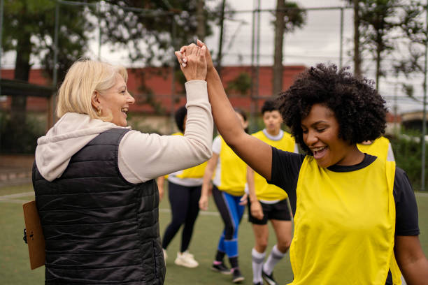 istock Women's soccer team greeting before the game 1396966764