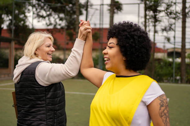 istock Women's soccer team greeting before the game 1396966765