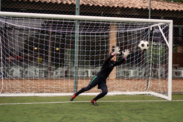 Female goalkeeper Catching the ball