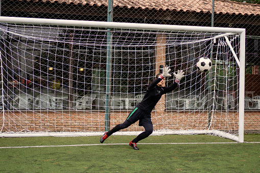 Female goalkeeper Catching the ball