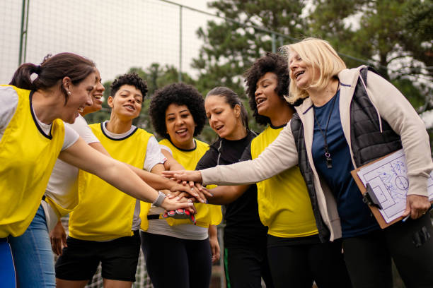 Women's soccer team greeting before the game