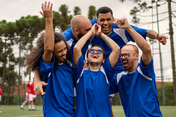 istock Transgender man celebrating scoring goal during soccer friendly game 1396967684