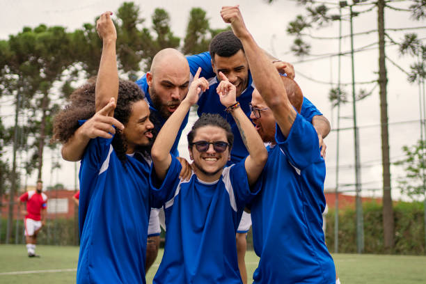 istock Transgender man celebrating scoring goal during soccer friendly game 1396967687