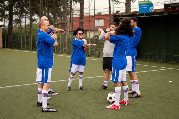 istock Soccer team warming up before the game 1396969016
