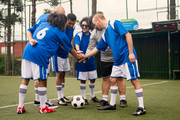 istock Soccer team warming up before the game 1396969052