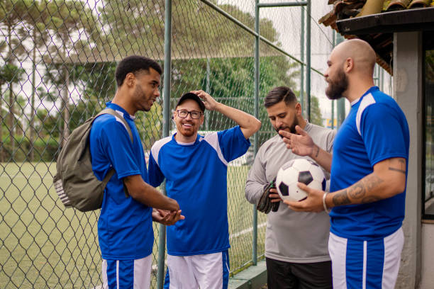 istock Men's soccer team talking before playing soccer 1396970196
