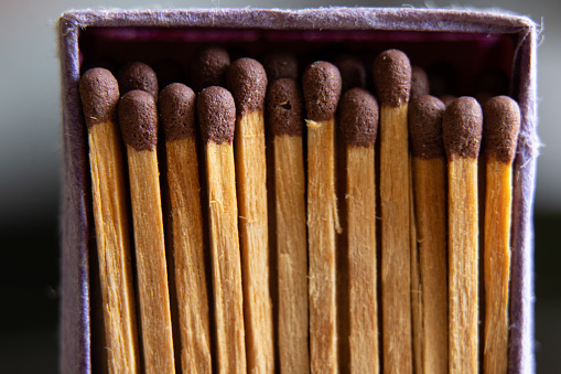 Old matches in a box close-up, match