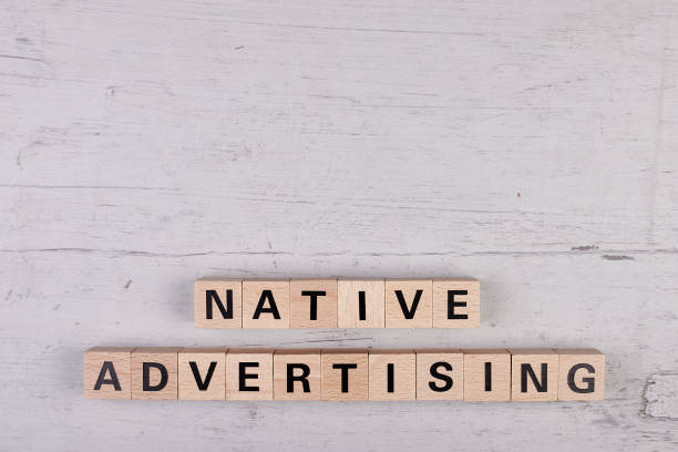 istock wooden blocks building the word NATIVE ADVERTISING 1396973434