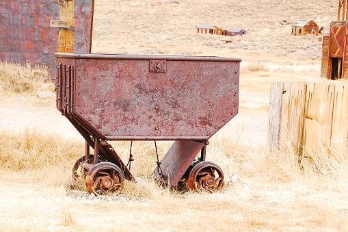 A mining cart sits empty and abandoned in Bodie, California.