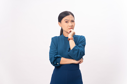 Asian woman thinking about problem, worried and confused standing isolated on background.