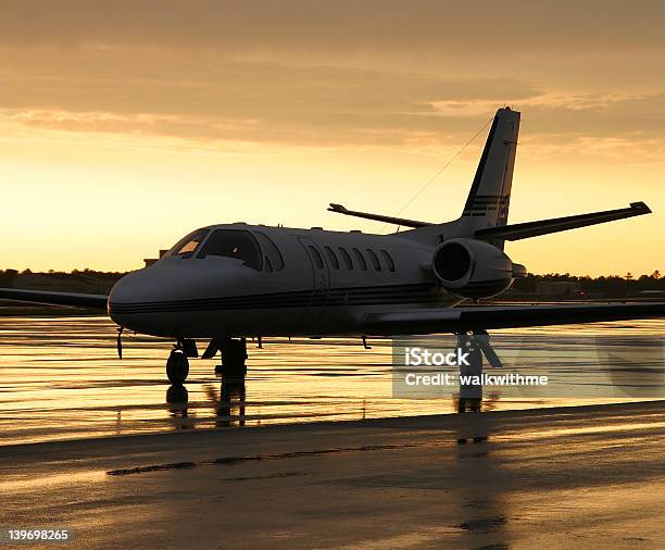 Private Jet On Stormy Ramp Stock Photo - Download Image Now - Commercial Airplane, Privacy, Air Vehicle