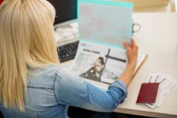 istock At travel agency 1396983624